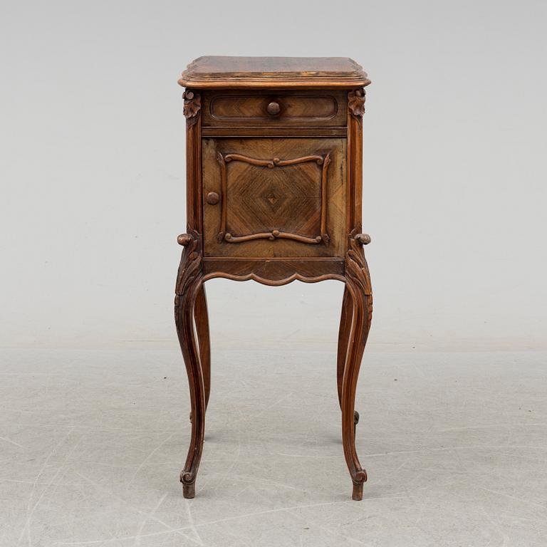 A late 19th century rococo style bedside table.