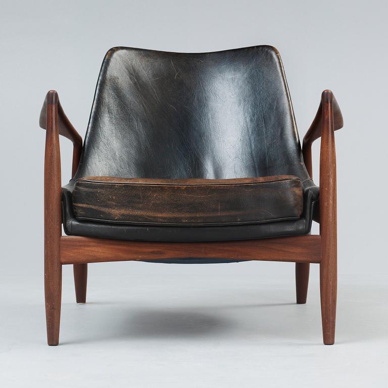 An Ib Kofod Larsen 'Sälen' teak and black leather armchair, OPE, Jönköping, Sweden 1950's-60's.