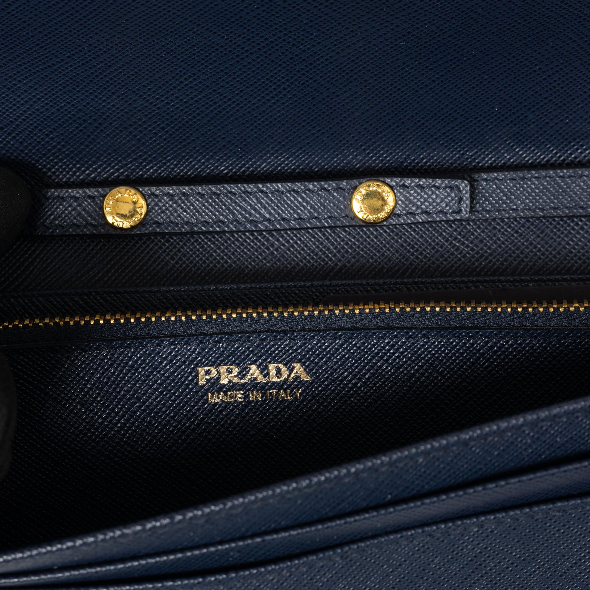 Prada, wallet on chain, 2016.