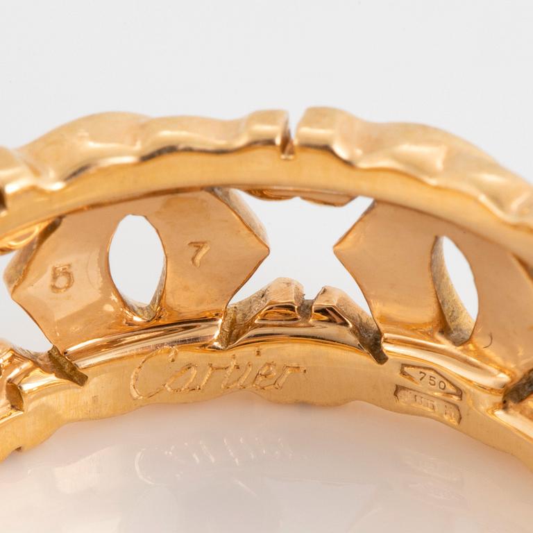 An 18K gold Cartier "Double C" ring.