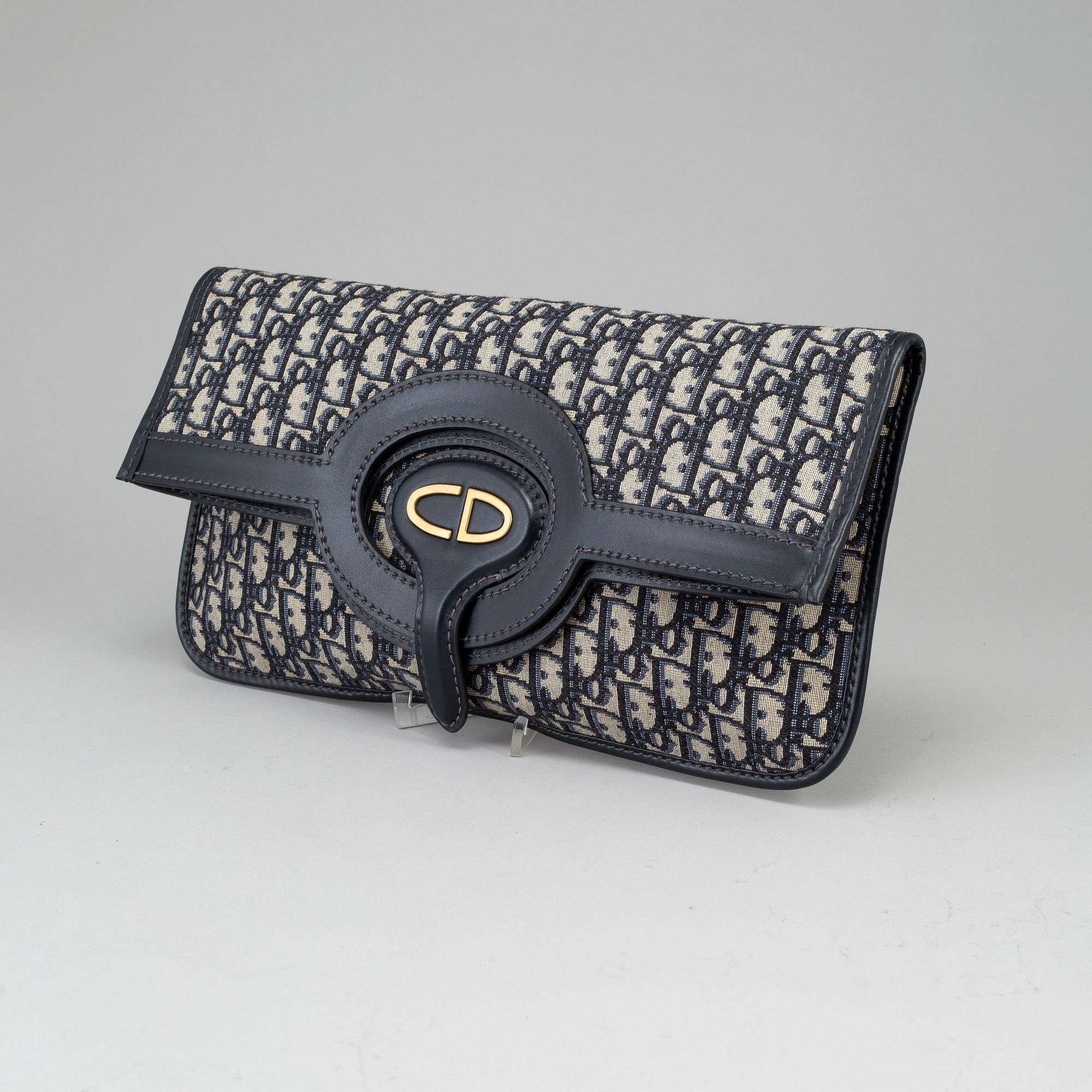 CHRISTIAN DIOR Oblique fold over convertible clutch Bukowskis
