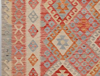 A carpet Kilim, ca 290 x 214 cm.