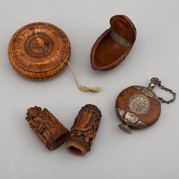 Five carved wood items, including a cup and a miniature bottle, 19th century.