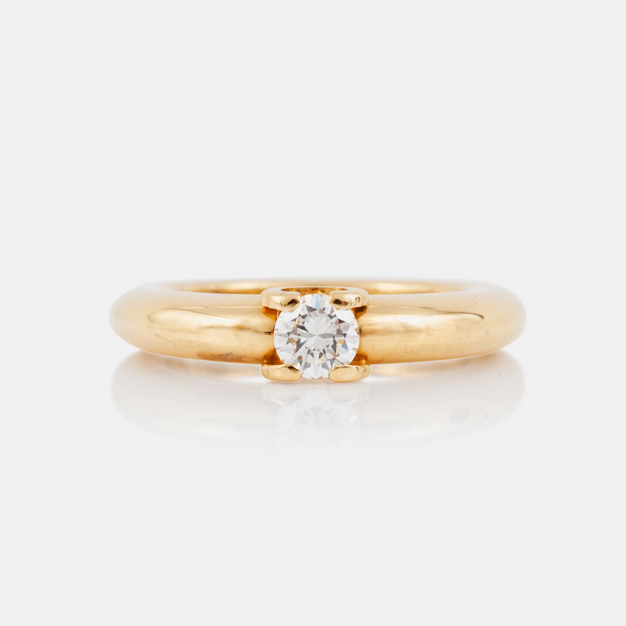 RING, signerad Cartier, Serienummer: 54KQ030, med briljantslipad diamant ca 0.35 ct. Kvalitet ca G-H/VS1.