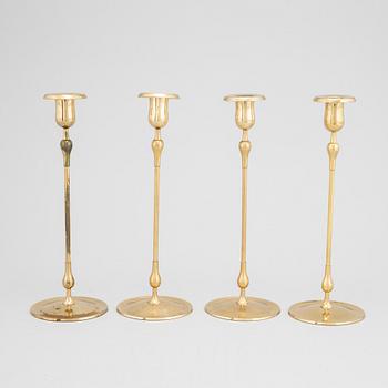 Gunnar Ander, a set of four brass candlesticks from Ystad Metall.