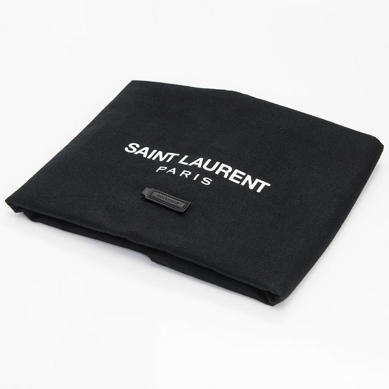 Saint Laurent, a 'Sac shopping' bag.
