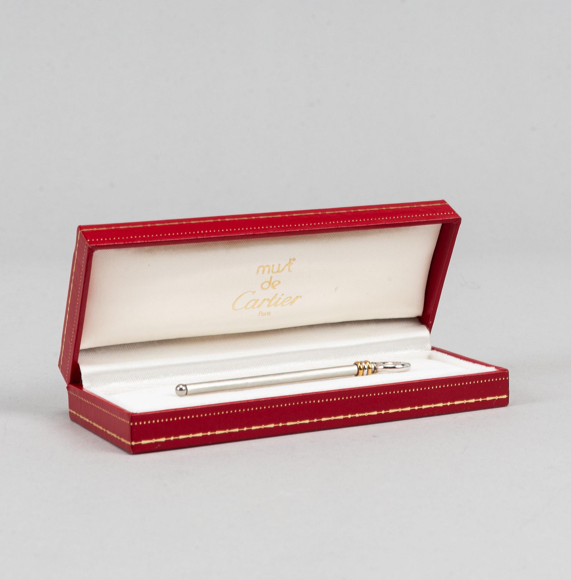 Cartier, jewelery box, key ring and Le must de Cartier champagne swizzle stick.