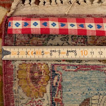 An antique Tabriz rug, Northwest Persia, c. 267 x 162 cm.