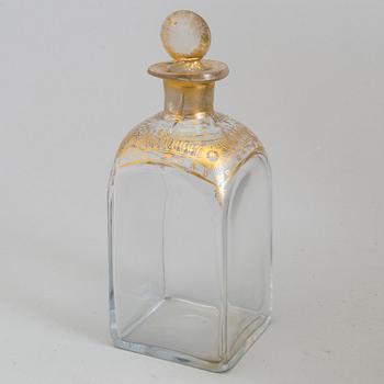 A first half of the 19th century wooden casket containing 6 flasks 2 glasses.