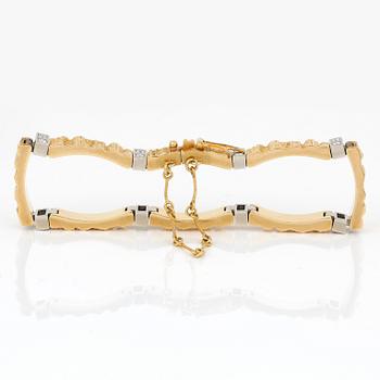ARMBAND, 18K guld, 16 diamanter, Lapponia, 1984. Vikt ca 30g.