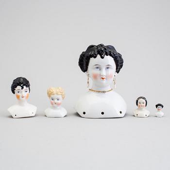 A lot of 12 dolls and doll heads in porcelain Germany early 20th century.