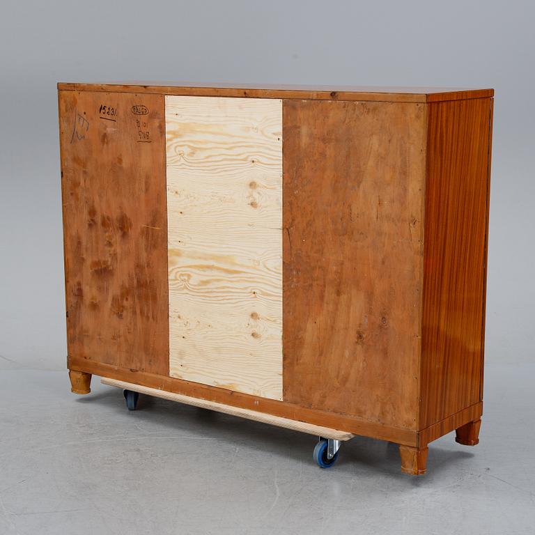 A 1940's Swedish Modern mahogany veneered cabinet.