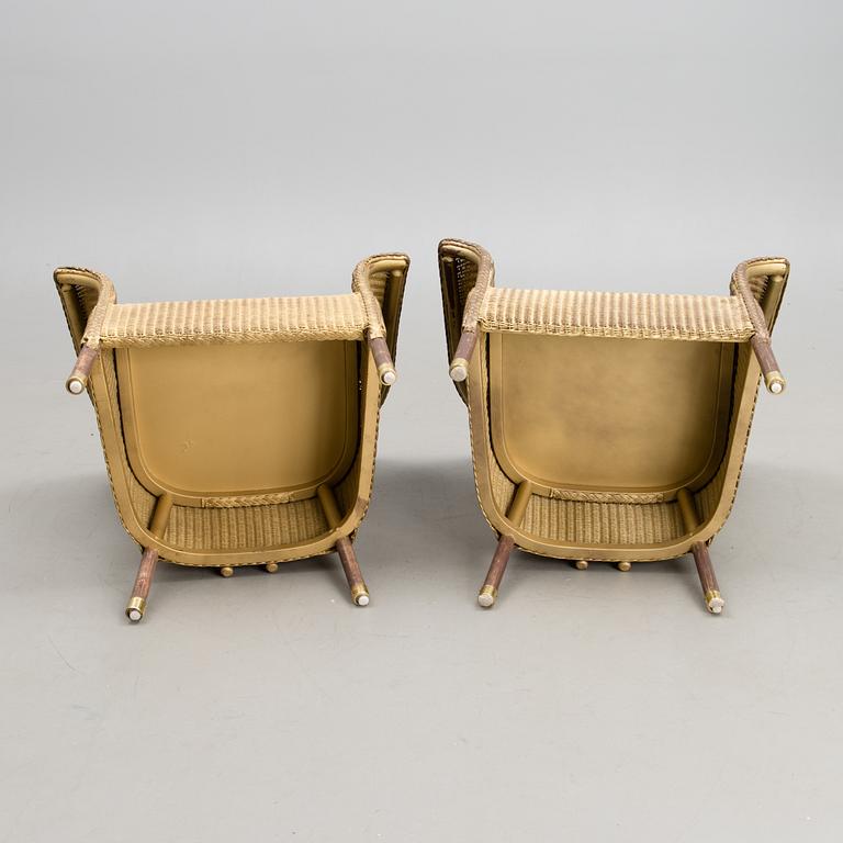 A PAIR OF ARM CHAIRS, Lloyd Loom, Spalding England, for Mulberry's Home, turn of the 21st century.