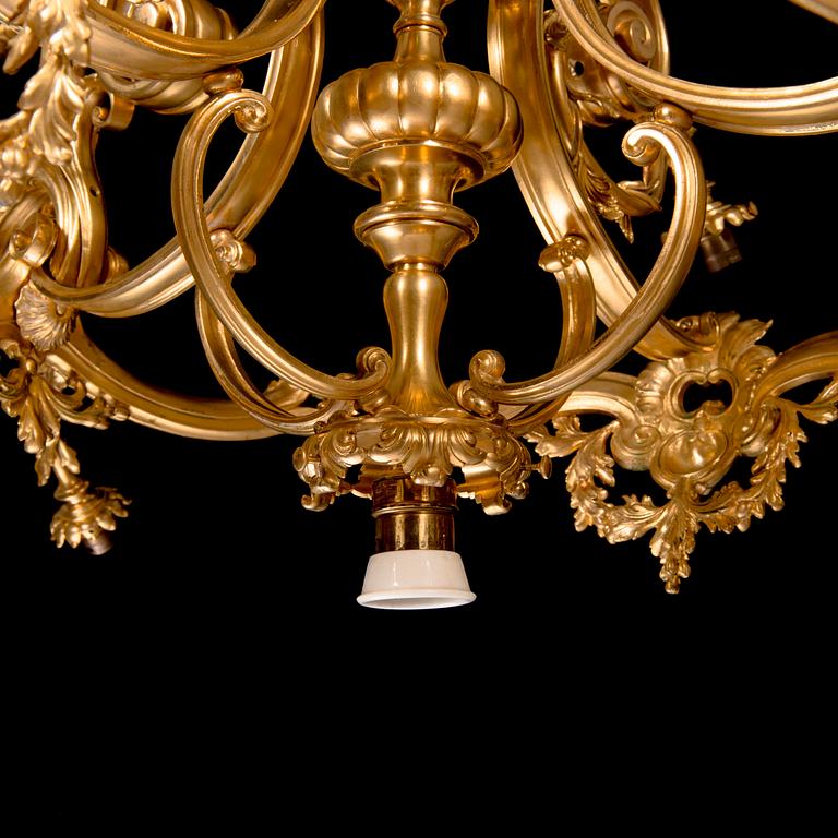 Ferdinand Barbedienne, A signed and gilded bronze chandelier from second half of the 19th century. Height 115 cm.