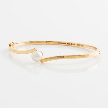 Bracelet 18K gold with a cultured pearl, Stigbert.