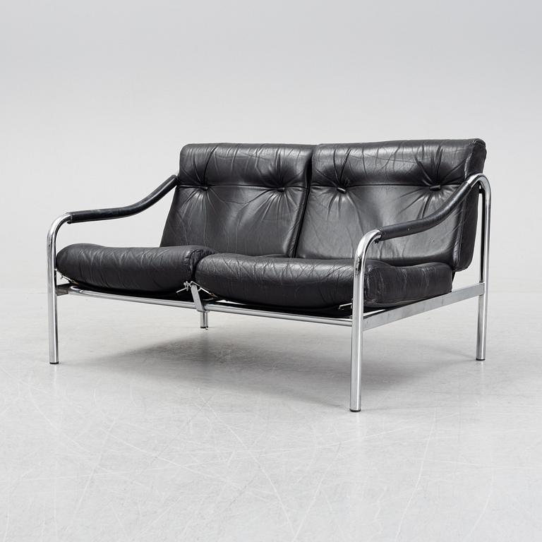 A 1960's leather upholstered 'Kadia' sofa  by Tim Bates for Pieff.