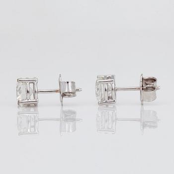 A pair of brilliant cut diamond earrings. The diamonds are 1.00ct and 1.00ct with quality G/VVS2.