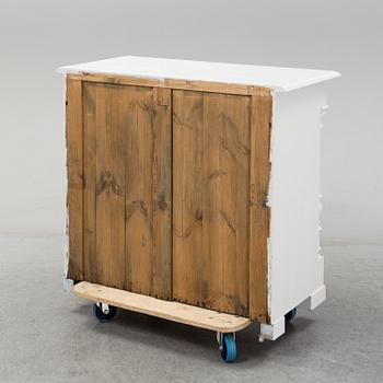 A painted sideboard, circa 1900.