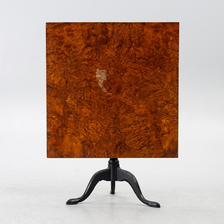 A tilt-top table, around 1800.