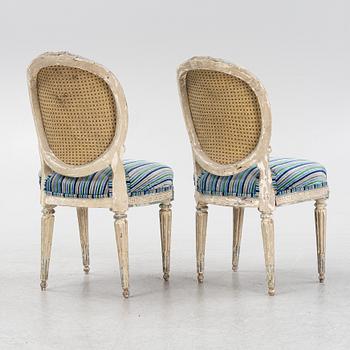 A painted pair of Louis XVI style chairs, 18th Century.