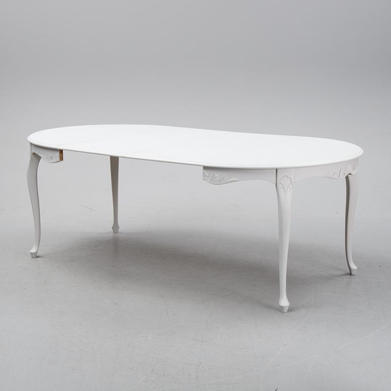 A painted Rococo style dining table, second half of teh 20th century.