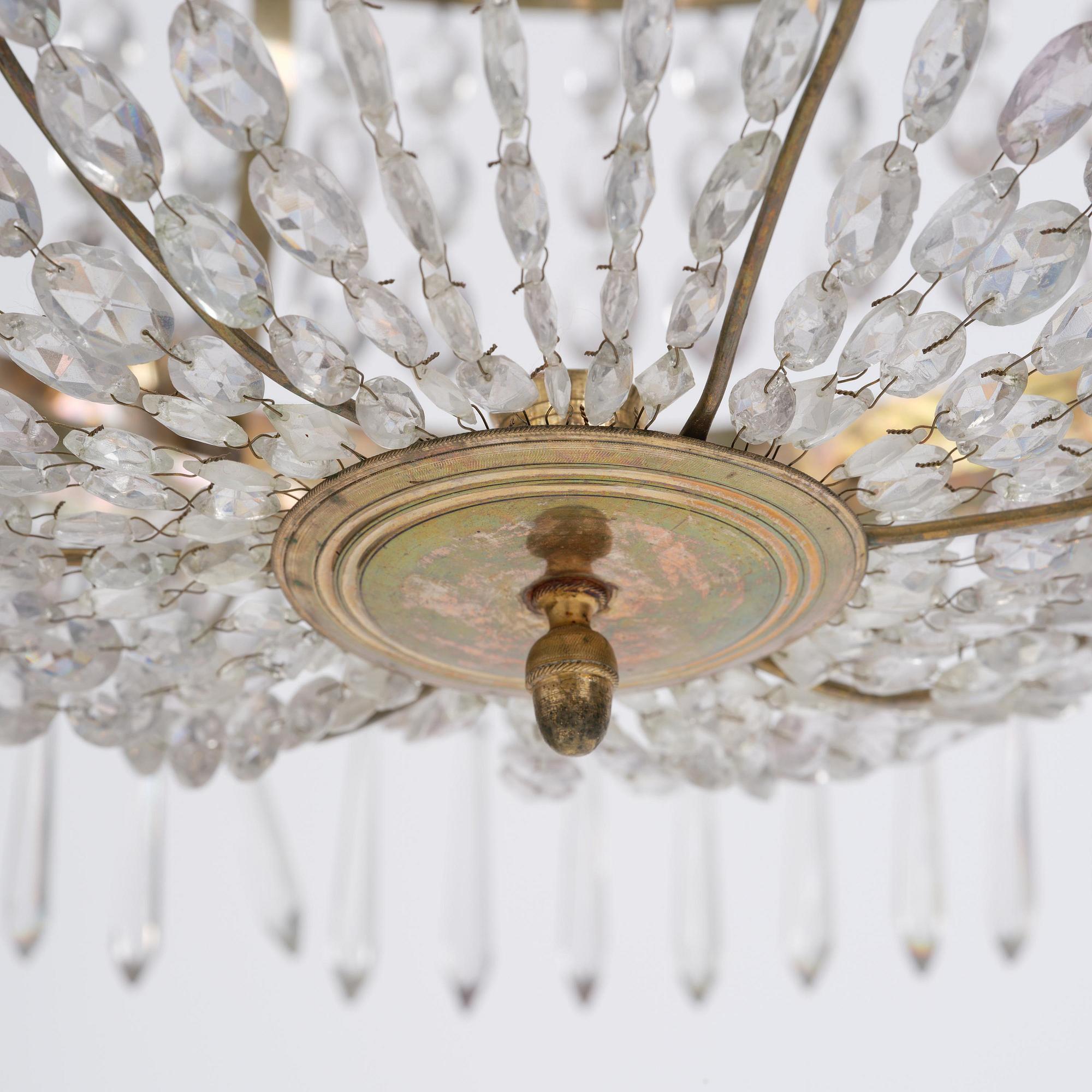A late Gustavian gilt brass and cut glass seven-light chandelier, Stockholm late 18th century.