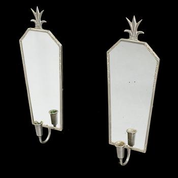 A pair of Art Deco mirror wall sconce from the 1930s.