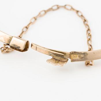 Armring, 9K guld med små diamanter och rubiner, sent 1800-tal/tidigt 1900-tal.