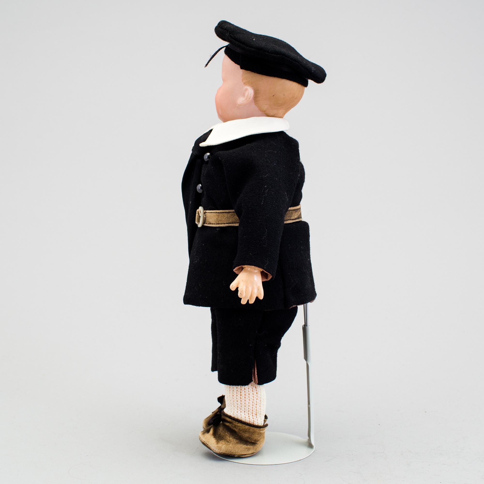 A bisque headed character doll 500 by Armand Marseille, Germany, ca 1910.