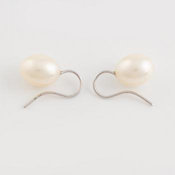 A pair of white gold earrings with cultured pearls.