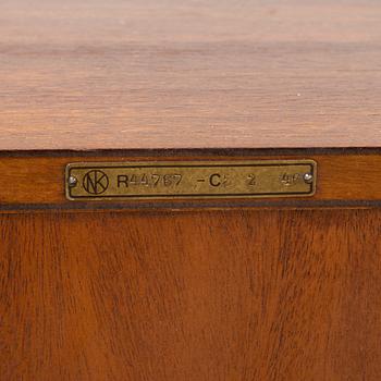 Nordiska Kompaniet, a pair of mahogany veneer bedside tables, 'Markus', the model designed in 1943.