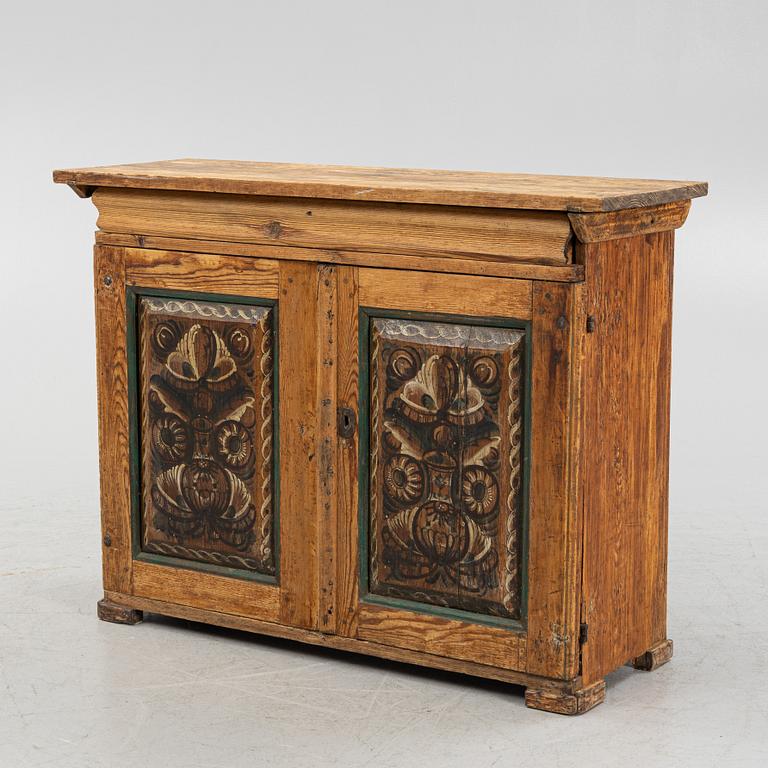 A pinewood cabinet, 19th Century.