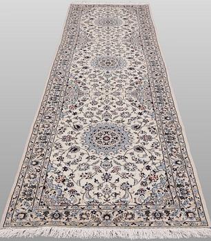 A Nain part silk runner carpet, 342 x 81 cm.