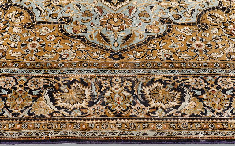 A carpet, silk Qum, ca 203 x 134 cm.