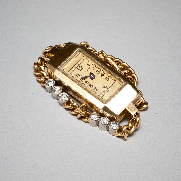 DAMARMBANDSUR, 18k guld, länk besatt med briljant- och antikslipade diamanter, ca 0,21 ct. 1940-tal. Total vikt ca 16 g.