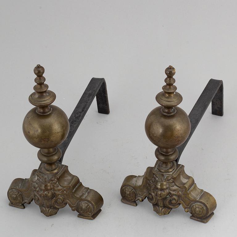 A pair of Louis XVI-style brass andirons.