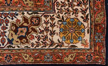 A semi-antique Tabriz carpet, c. 395 x 295 cm.