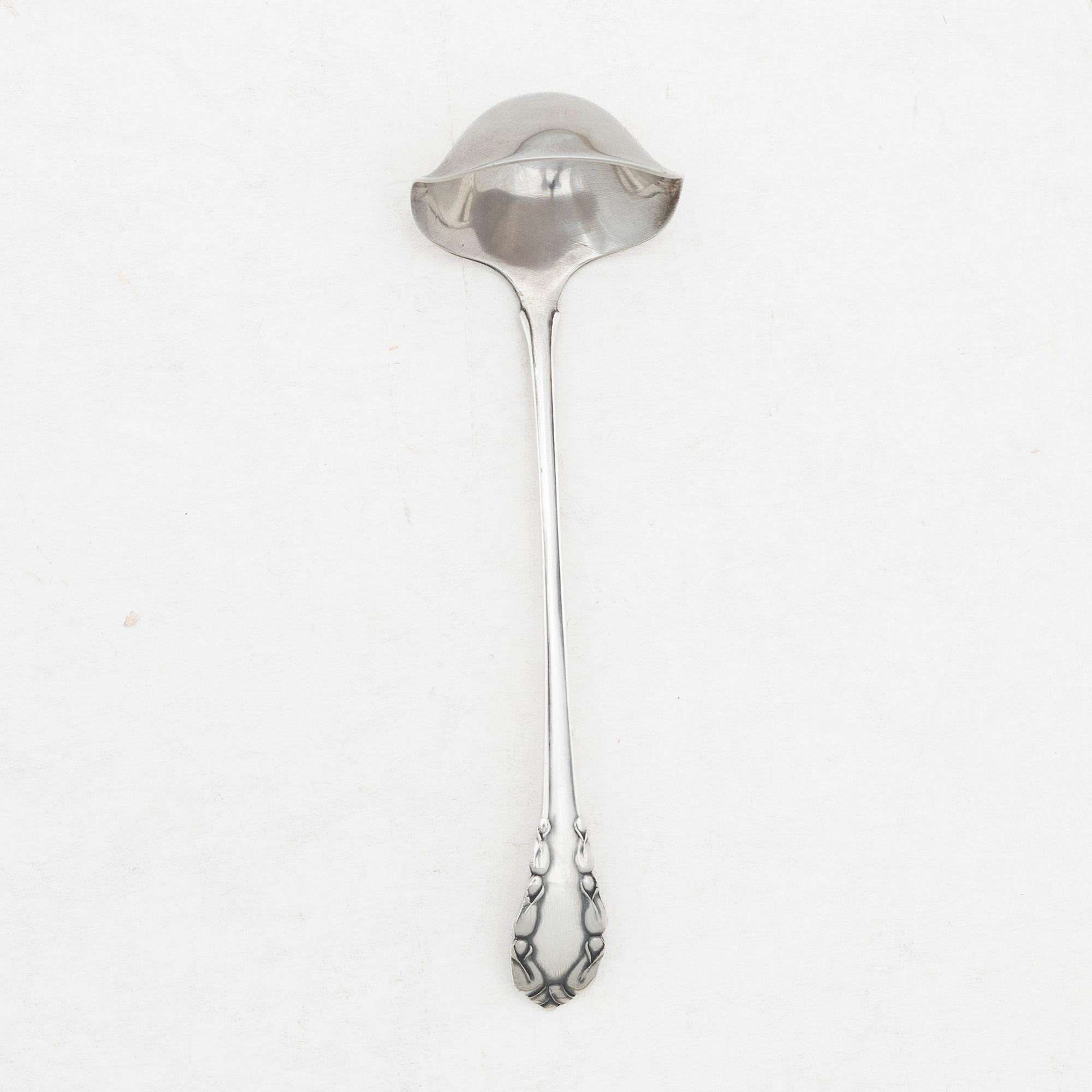 Georg Jensen, a small sterling silver gravy ladle, model "Liljekonvalj"(Lily of the Valley), Copenhagen, Denmark, 1929.