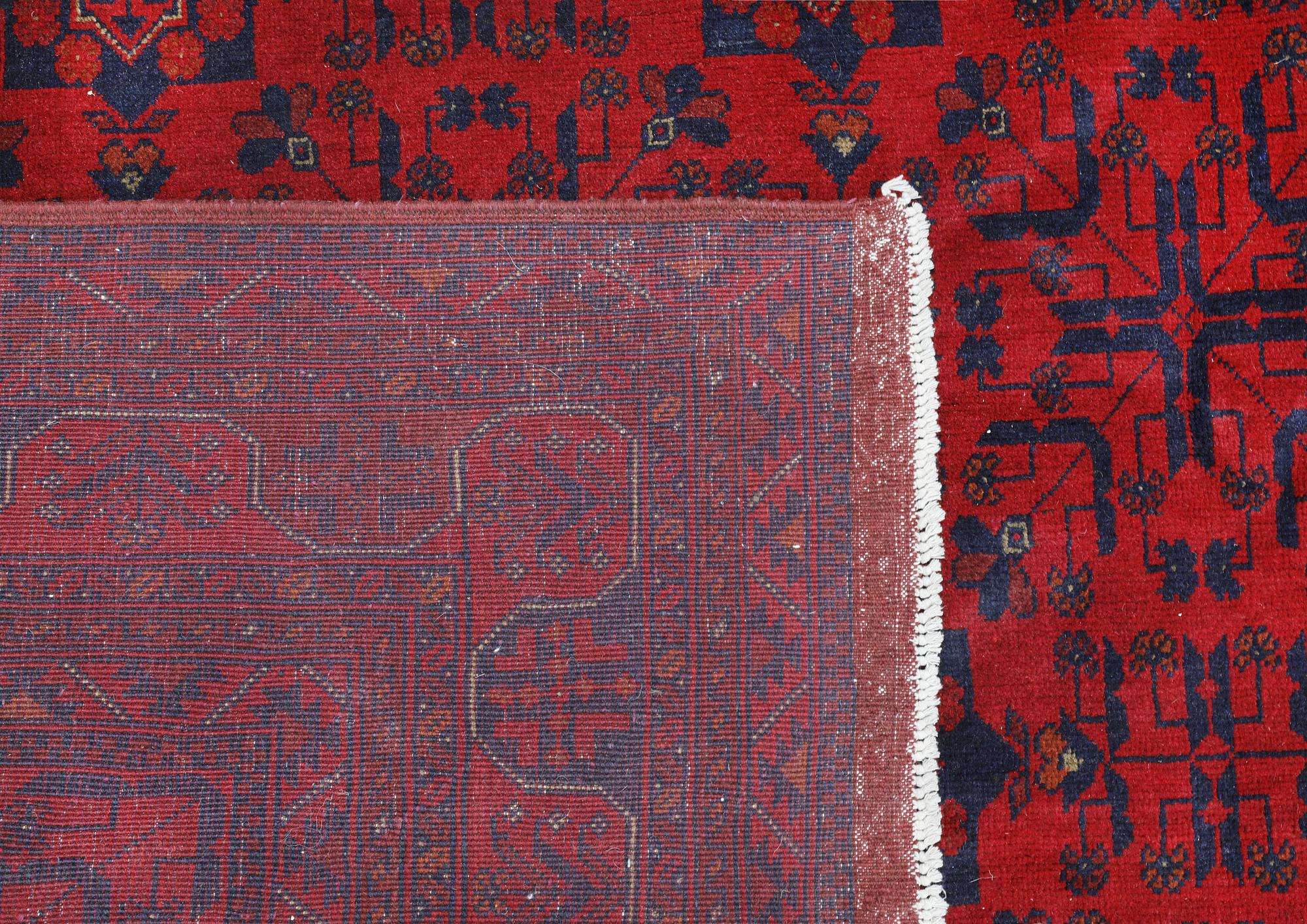 A Afghan fine carpet, 297 x 205 cm.