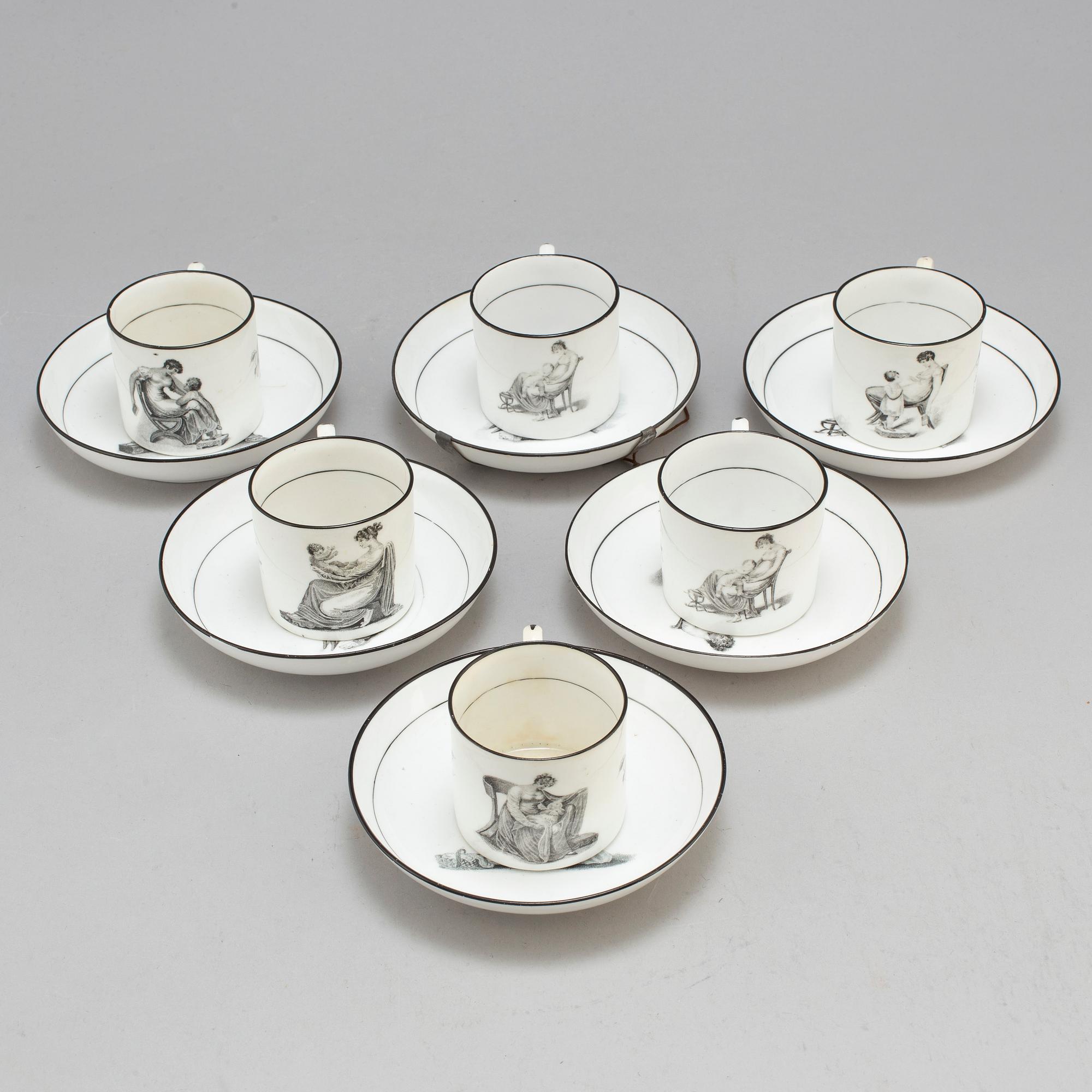 Six soft paste cups with saucers, early 19th century.
