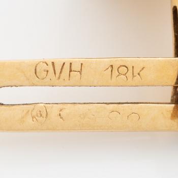 A pair of shirt studs 18K gold.