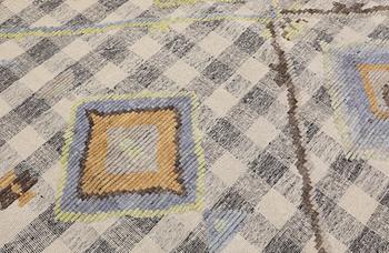 A kilim carpet with relief, 361 x 273 cm.