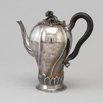 A bulbous silver coffeepot maker's mark Charles Stuart Harris, London, 1893.