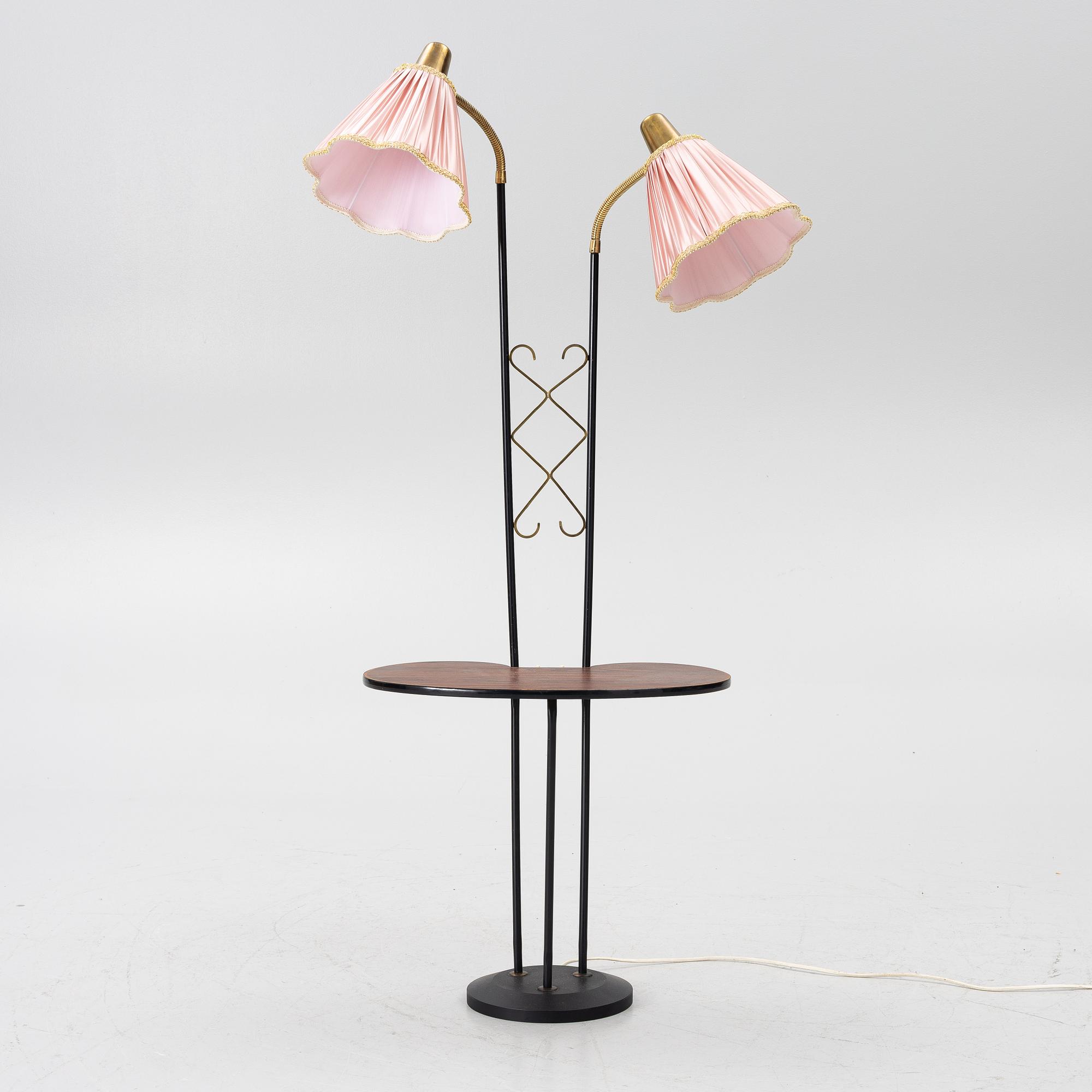 A floor lamp with table, 1940s.