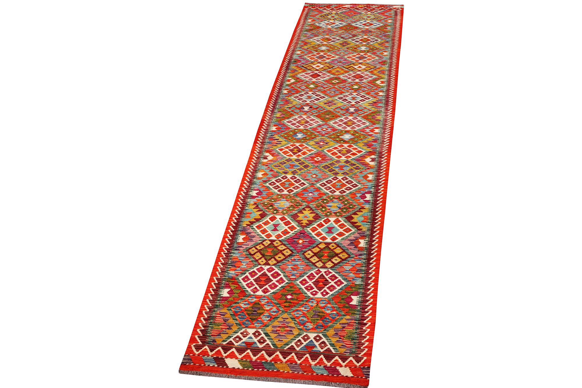 A Kilim carpet, c. 482 x 63 cm.