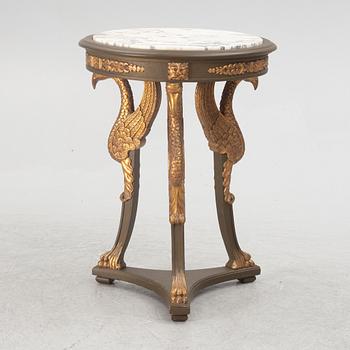 A pair of chairs and a side table, second half of the 20th century. Empire style.