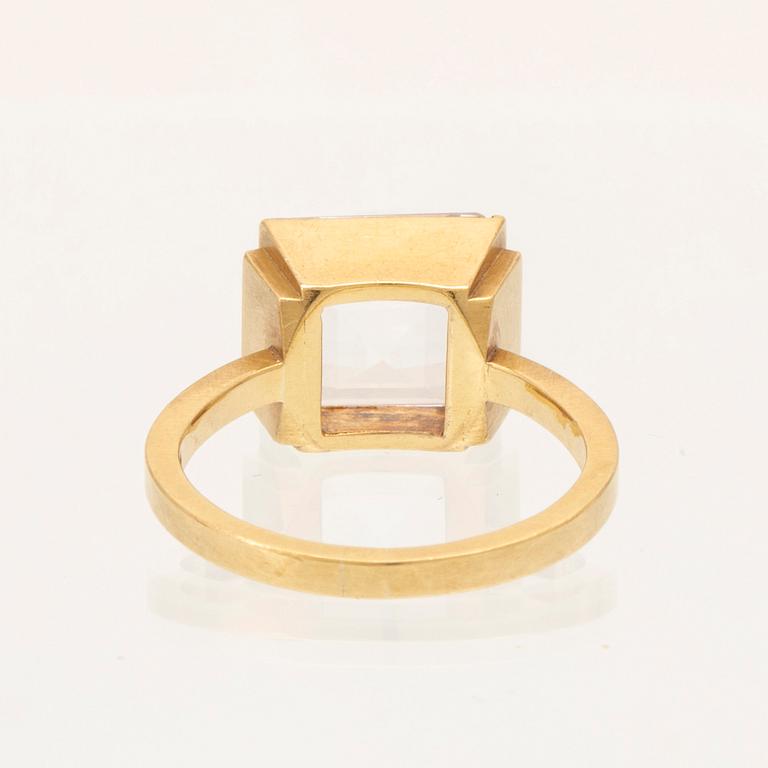 An 18K gold ring set with square step cut topaz by Wiwen Nilsson 1944.