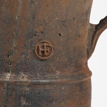 A cast-iron garden urn from Hellefors styckebruk, dated 1791.