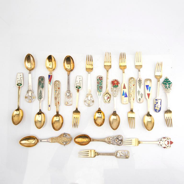 Anton Michelsen, Christmas cutlery, 21 pieces, gilded sterling silver and enamel, Denmark total weight 888 grams.