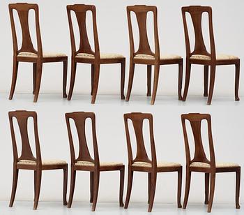 A Swedish Art Noveau mahogany dinner table with eight chairs, Kullman & Larsson, Malmö 1914.